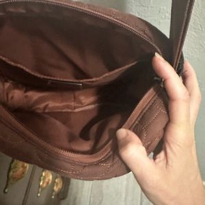 Lululemon quilted embrace crossbody bag.  Ancient copper color.  GUC.